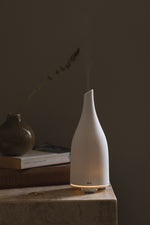 Discover our diffusing solutions to scent your space in style.